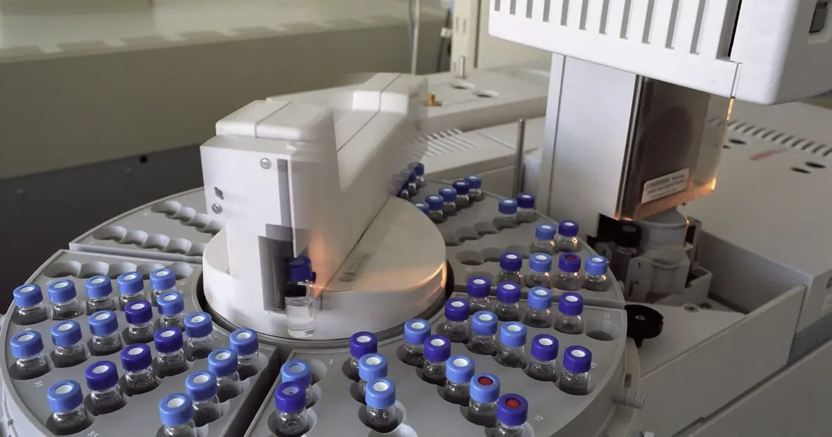 High-tech laboratory equipment with multiple vials in a scientific research facility