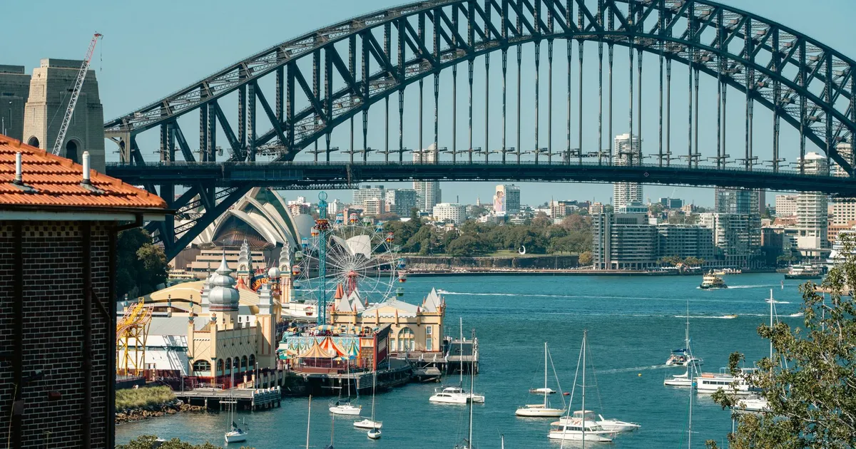 Sydney Harbour Bridge with sailboats on the harbour