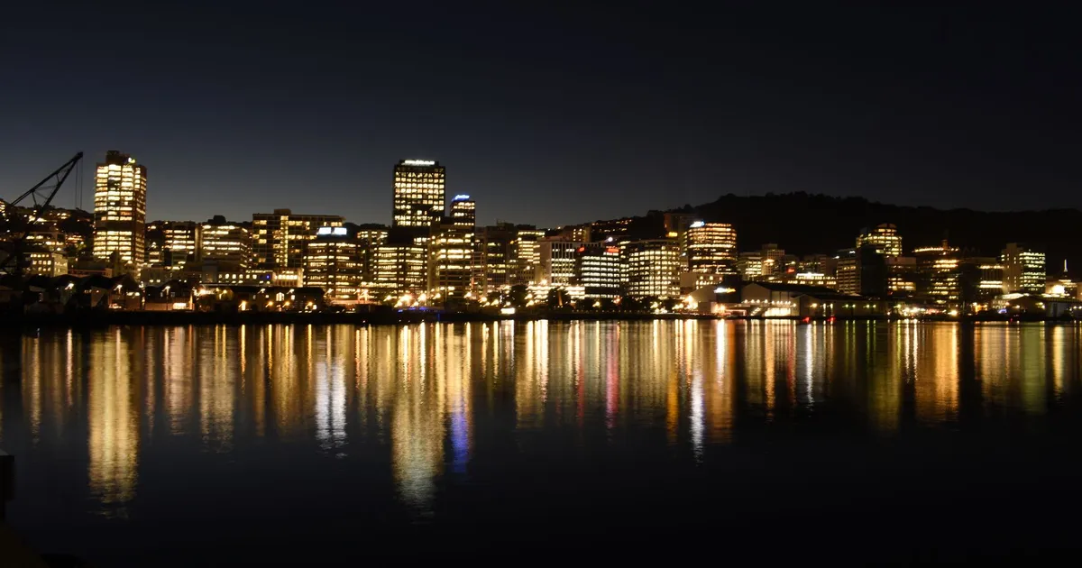 Wellington city lights reflected on the harbour at night