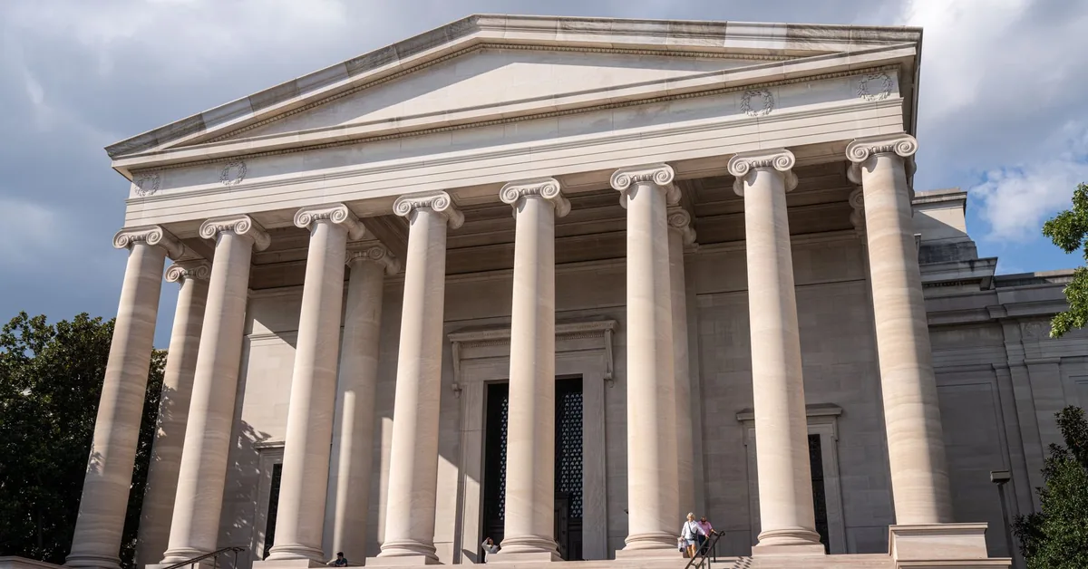The columned facade of a neoclassical government building
