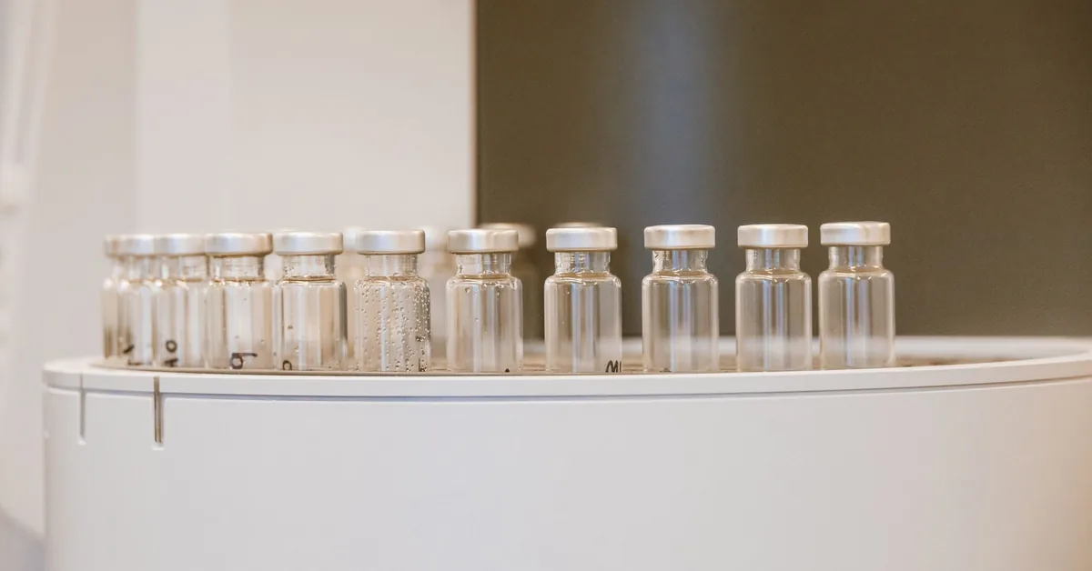 A rack of clear sample vials in a laboratory