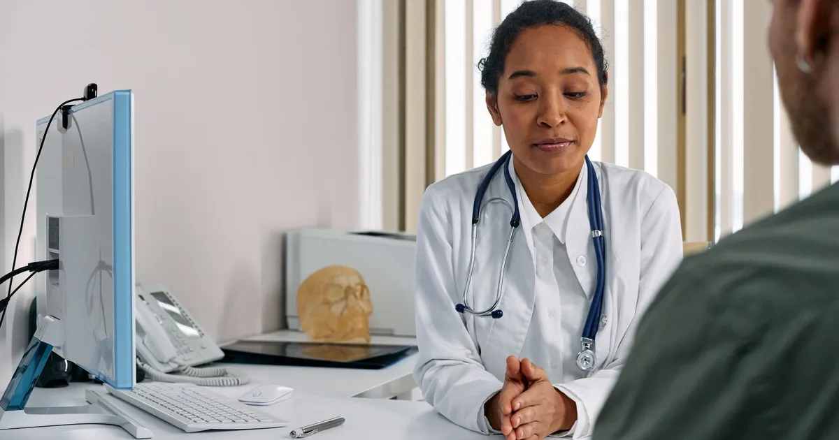 A female doctor consulting a patient in a medical office