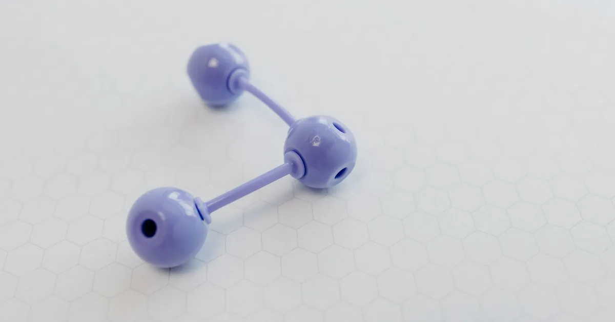 A ball-and-stick model of a molecule on a plain background